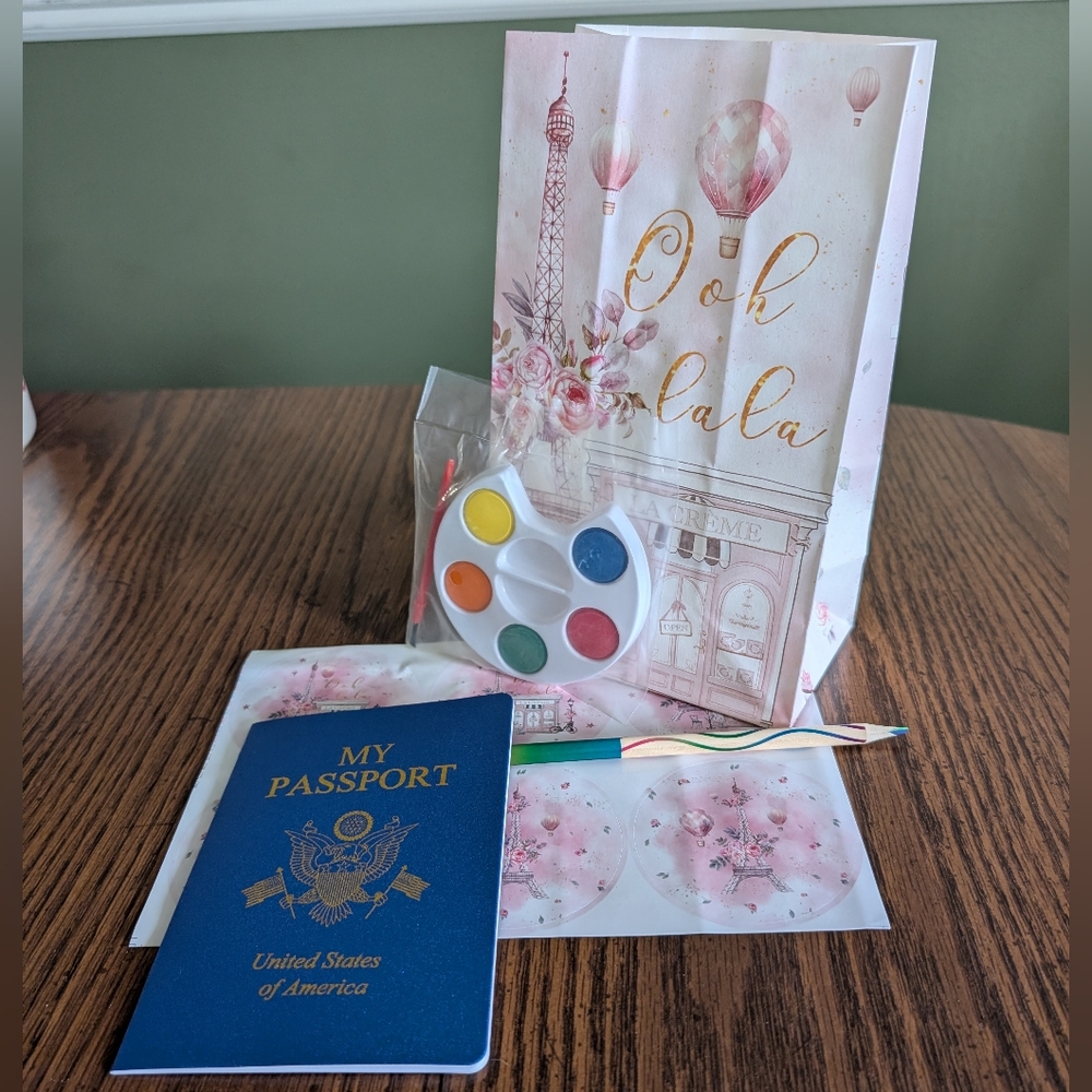 Ooh La La Party Favor Set With Passport Booklet and Cupcake Build-A-Face Sticker